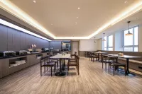 Weite International Hotel (Huanggang Wuxue Bus Station) - พร้อมอาหารเช้า