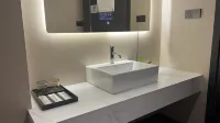 Xinyoulian Business Hotel