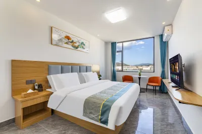 御龍灣飯店(麗江高鐵站店) 世界記憶遺產公園附近的飯店