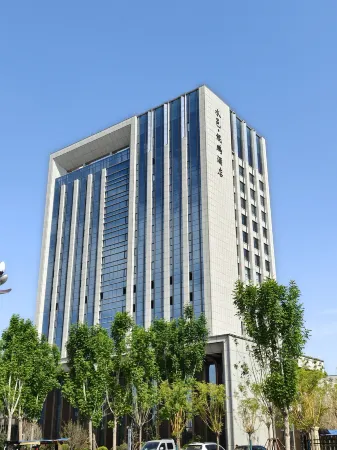 Dongming Shuiyi Kunpeng Hotel Отели в г. Дунмин