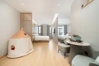 Anshun 21° International Holiday Hotel (West Railway Station Vientiane Tourism City) - جديد