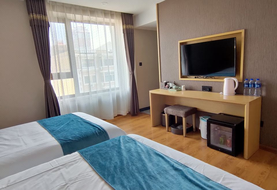 하얼빈 조이 부티크 호텔의 세련된 객실 내부