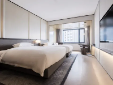 Hawaii International Hotel Hoteles en Mudanjiang