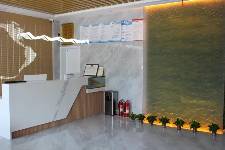 Dongzhi Xiangzhang Guoshang Business Hotel Отели в г. Дунчжи