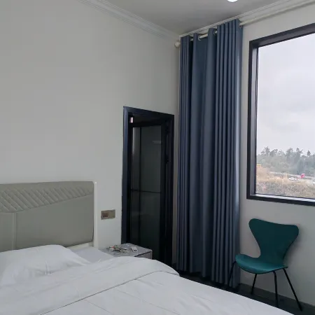 Guibao Apartment (Chongqing Tourism College) Отели рядом с достопримечательностью «Холл-Стрит Планирование Выставок»