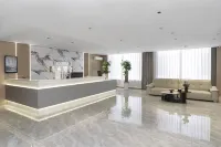 Daqing Youmi Hotel ( Bayi Agricultural University Moma Plaza)