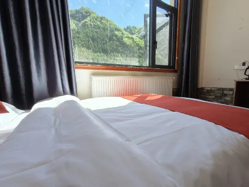 Daoyu Bamei Style Hotel - Bergblick