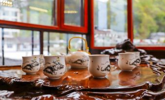 Floral Hotel · Mountain Whisper Hotel(Shennongjia Wooden fish store)