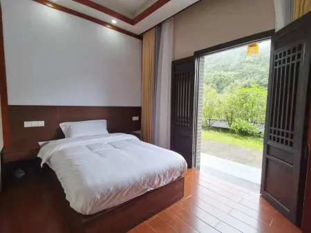 Yao Village Historic Street Lodge Отели в г. Тунчен