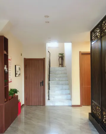 South Guizi Ju Hotel Отели в г. Таонань