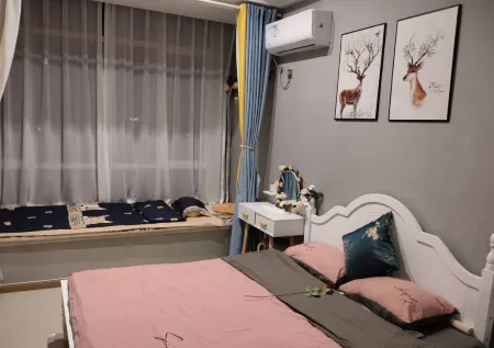 Qingyi Apartment Отели рядом с достопримечательностью «Zhangjiagang Campus， the City Vocational College of Jiangsu (Binjiang Avenue)»