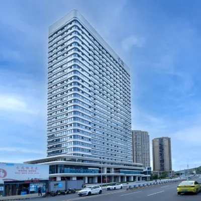 Wells Hotel (Central Park Light Rail Station, International Expo Center Branch) โรงแรมใกล้วัดฉงเหยียน