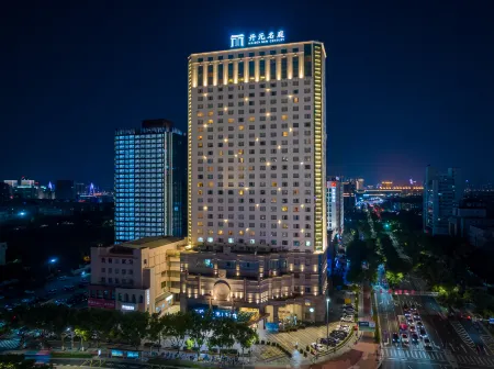 Maison New Century Hotel Ningbo Отели рядом с достопримечательностью «Zhejiang Pharmaceutical College»