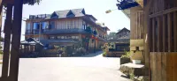 Lancang Bajiao Tower Home Hotel