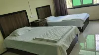 Minquan Guest House