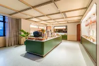 Orange Hotel (Zhaosu Tianma International Plaza Branch) - فطور