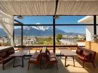 Beyond the Clouds · Golden Sunrise | Snow Mountain & Lake View Secret Garden Hote Hotels in Lijiang