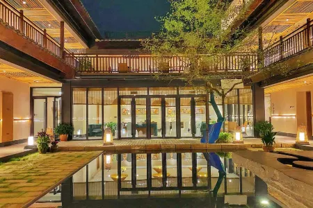 Hotel MoMc Jiuhuashan Отели рядом с достопримечательностью «Statue of Kṣitigarbha Bodhisattva»