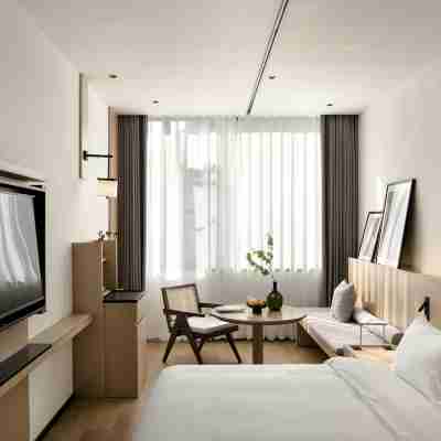 SFEEL設計師酒店(樂山張公橋美食街店) Rooms