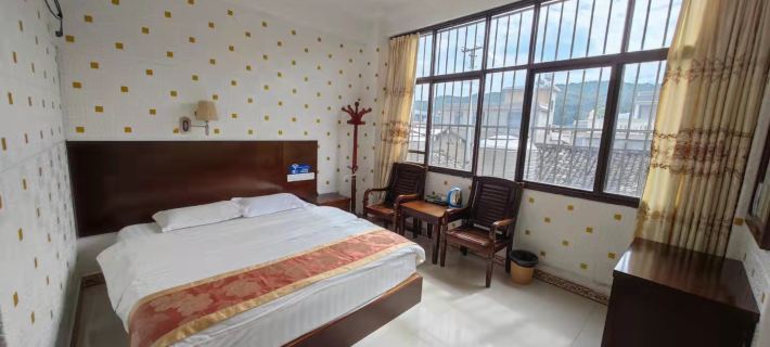 Longling Jianping Hotel โรงแรมในหลงหลิง