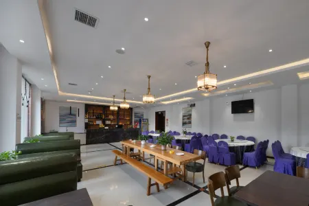 Qixinlong Sightseeing Hotel Отели рядом с достопримечательностью «Zhusheng Bridge»