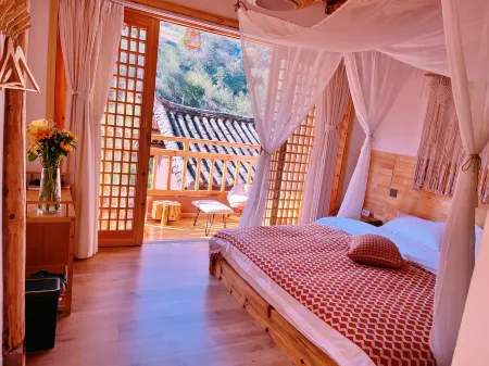 Chimuyoujie Homestay Отели в г. Юньлун