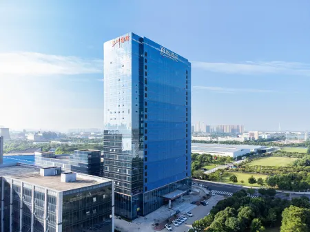 ECHARM HOTEL (WuHan Economic Development Zone Aeon Sports Center Branch) Отели рядом с достопримечательностью «Jiuzhen Forest Park»