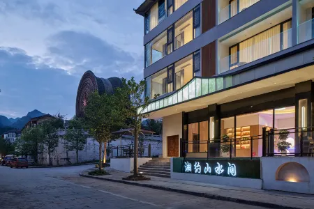Xiangyue Shanshui Homestay (East Gate Store of Libo Xiaoqikong Scenic Area) Отели в г. Либо
