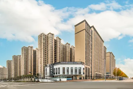 Jifeng Hotel (Xinyang East Station Branch) Отели рядом со станцией Xinyang East Railway Station