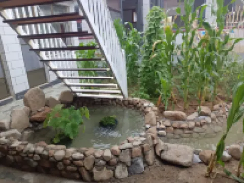 Kelaixuan Homestay Hotels near Aolunda Buluo·Putaojiu Museum