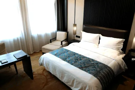 Jiasheng Liting Hotel Отели рядом с достопримечательностью «Народное правительство округа Сокко»