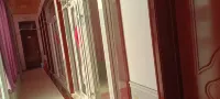 Pingyi Liangshi Supermarket Hotel - Losmen