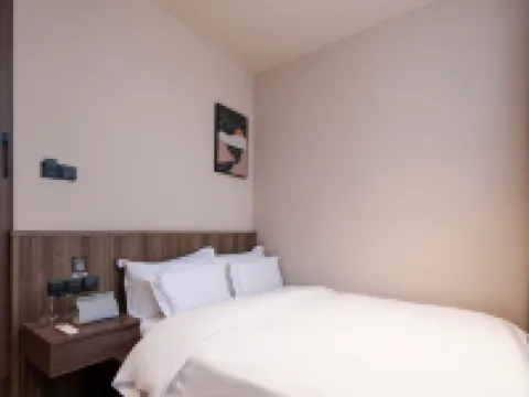 Fangjia Hotel (Longyan Train Station) Hoteles en Longyan