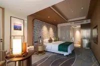 Oriental Cobure Hotel Hotels near Jinbao Paradise