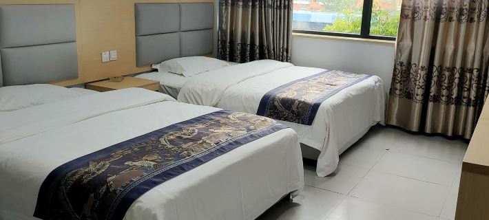 Yilong Jiajia Business Hotel Hotels in Yilong