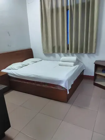 Dengzhou Guangshun Inn Отели рядом с достопримечательностью «Nanyang Vocational College of Science and Technology»