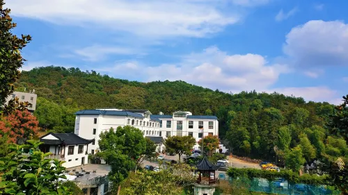 Ever-Joy Muxin Xiangcun Hotel - avec sources thermales