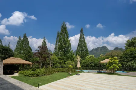 Xinchang Huaqianyueshang Homestay (Nineteen Peaks) Отели рядом с достопримечательностью «Qianzhang Canyon»