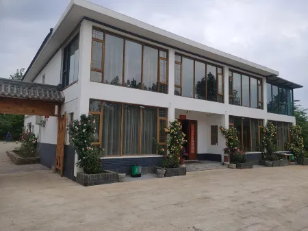 Shi De Ban Ri Xian B&B Отели рядом с достопримечательностью «Langxixian Wuyuan Shan Shui Nongye Park»