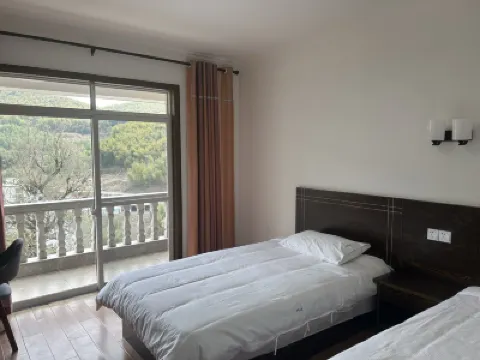 安吉阿明山莊 鄰近藏龍百瀑漂流的酒店