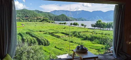 Tingting Inn Lugu Lake Отели рядом с достопримечательностью «Modai Wangfeifu»