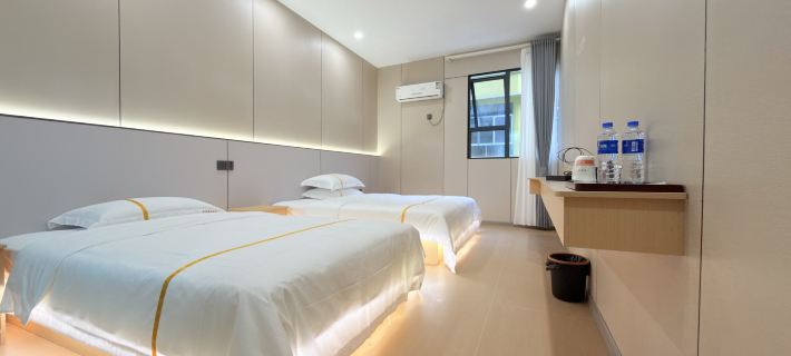 Cangxi Jinhao Business Hotel Hotele w: Powiat Cangxi