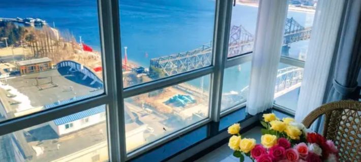 Xiaojie Guesthouse (Dandong Yalu River Broken Bridge Branch) Hotel di Dandong