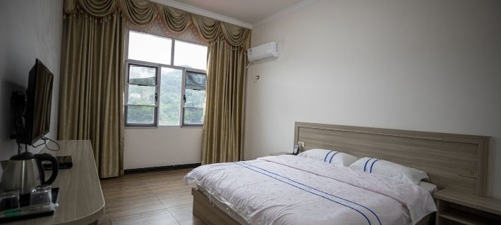 Qingjiang Gallery Happy Valley Homestay Hotel di Changyang