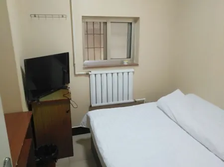 Qixia Aorun Hostel Отели в г. Цися