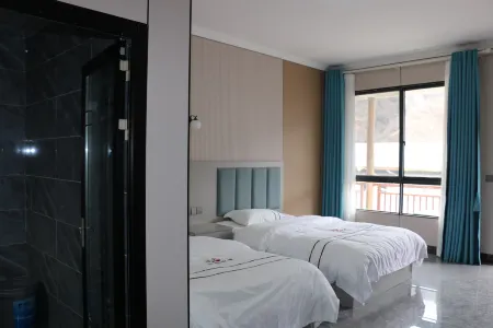 Pingwu Guzhai Gushi Homestay Отели рядом с достопримечательностью «Baimazhai Village»