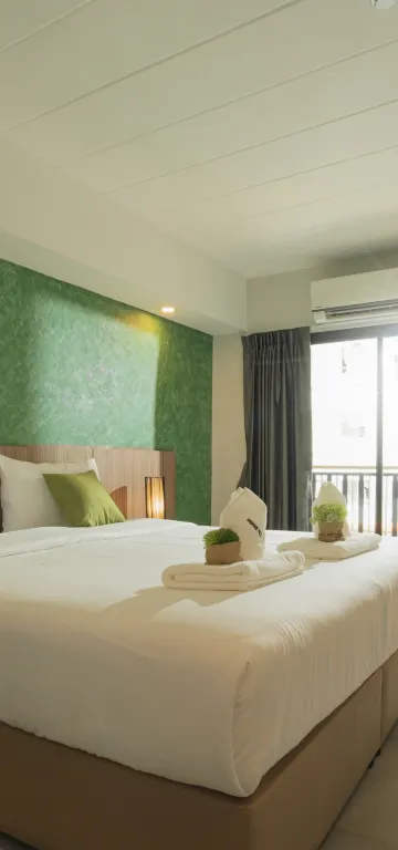 ห้องดีลักซ์ เตียงใหญ่ 1 เตียง