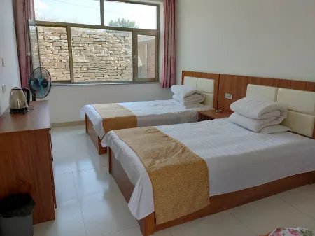 Pianguajinwalenongjia Inn Отели в г. Пяньгуань