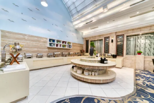 Hangzhou Huaxi Hotel (Yintai Department Store Linping Branch) Отели рядом с достопримечательностью «Zhongdu Square»