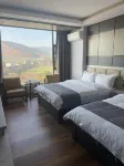 Dali Heqing Xiangyu Zhineng Inn (Huangpingzhen) - balcony